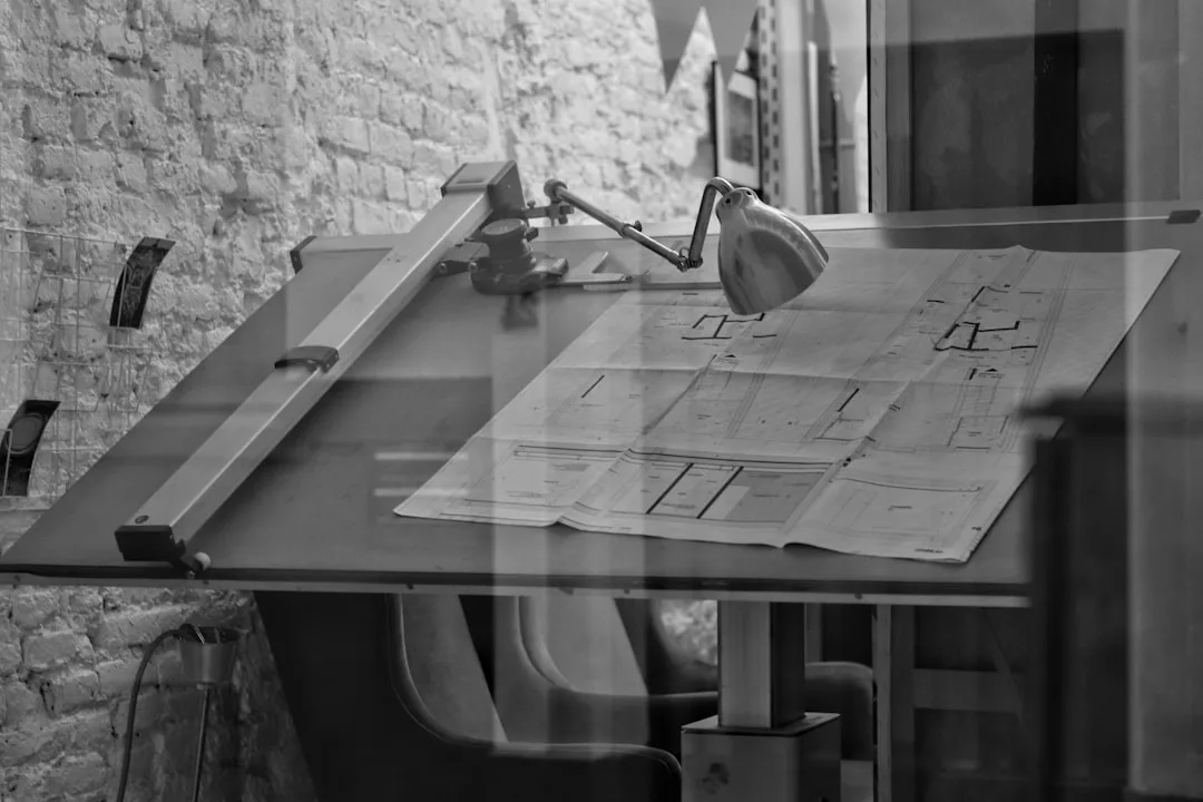 Technical drawings and plans on a desk