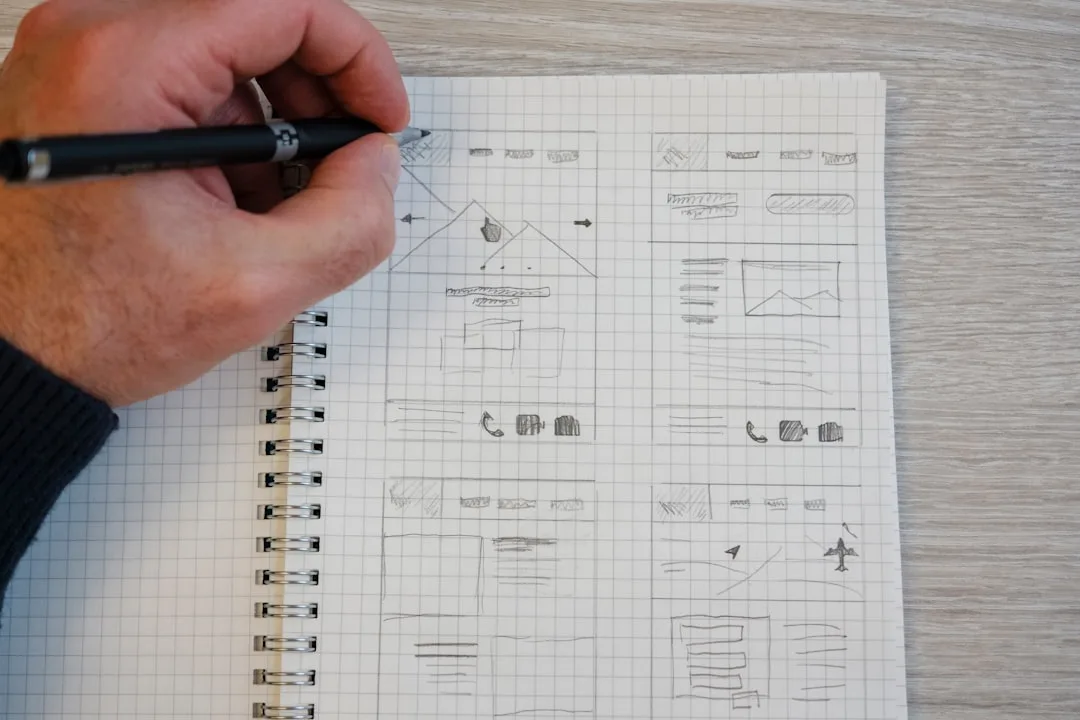 UX designer working through wireframes and prototypes